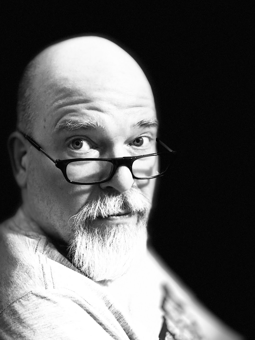 A black-and-white portrait of Tim Ottinger.